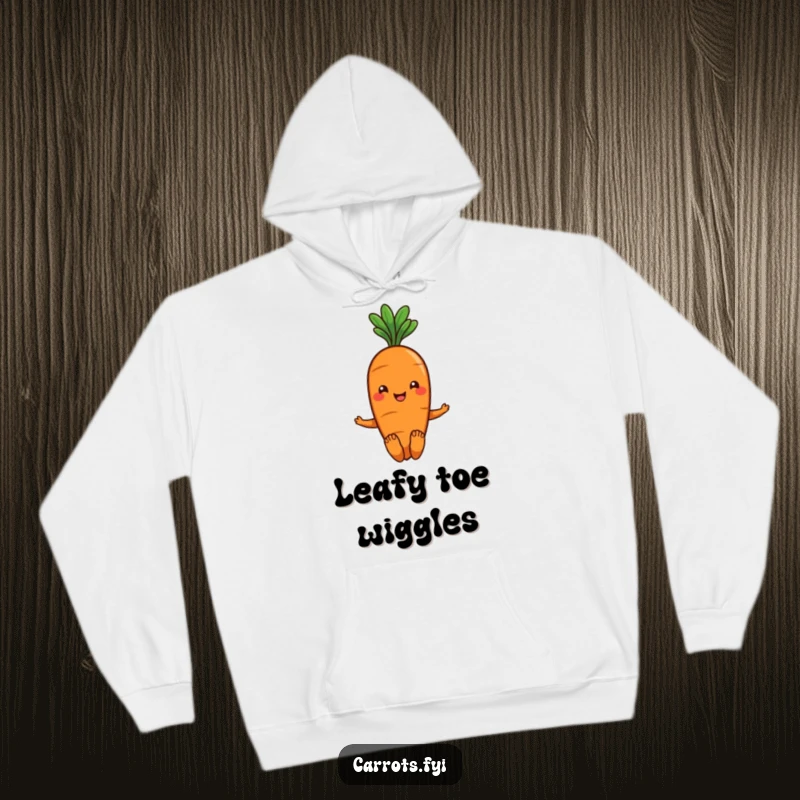 Funny smiling carrot hoodie with green leafy hair, joyfully wiggling its toes, offering warmth and comical charm.