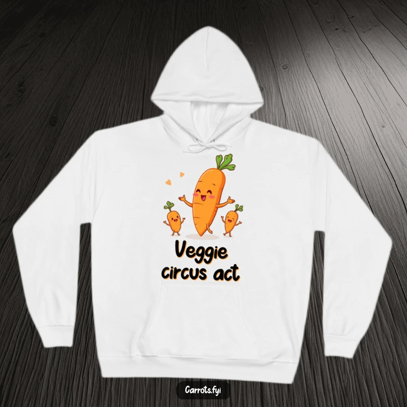 Funny hoodie graphic of an anthropomorphic carrot character in action, juggling three smaller root vegetables with impressive skill and a happy face.